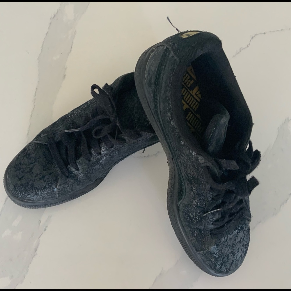 Black Puma sneakers